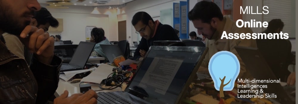 Graduates participating in MILLS online assessments for cognitive, behavioural, and leadership profiling.